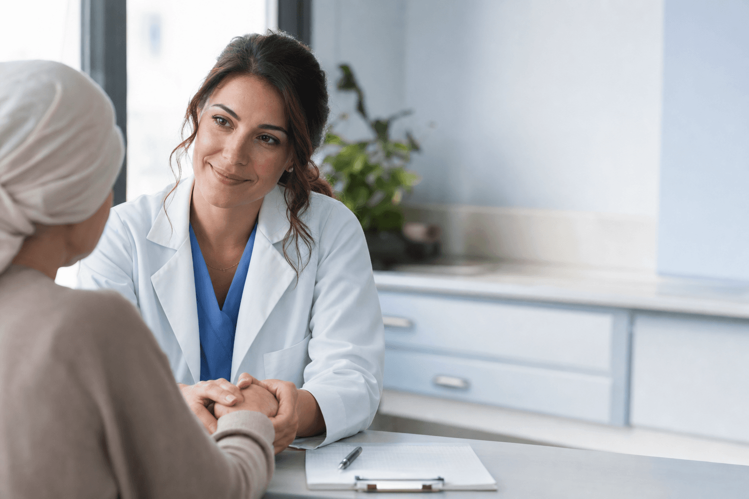 Oncologist talking with a patient